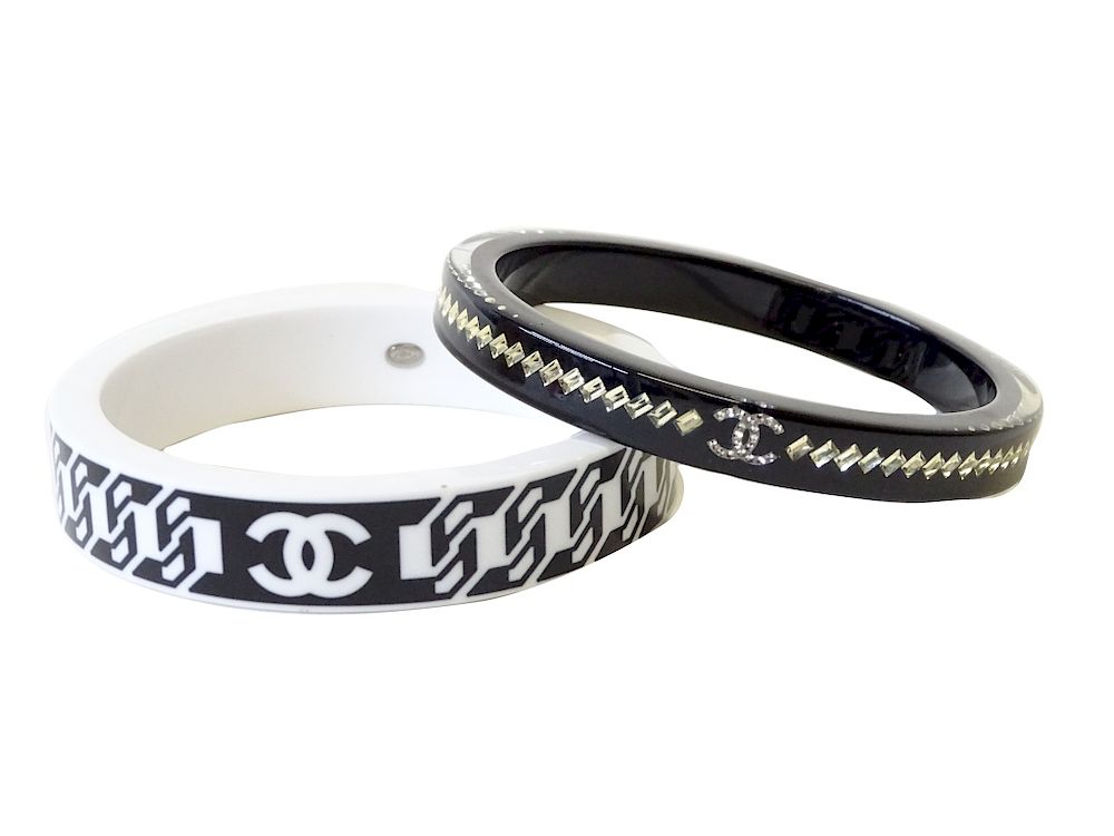 Appraisal: Pair of Chanel Resin Bangles Pair of Chanel Resin Bangles