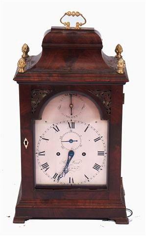 Appraisal: A GEORGE III MAHOGANY BRACKET CLOCK the silvered break arch