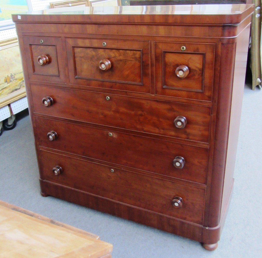 Appraisal: A th century Scottish plum pudding mahogany and mother of