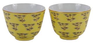 Appraisal: Pair Yellow Glazed Porcelain Tea Bowls Chinese th century each