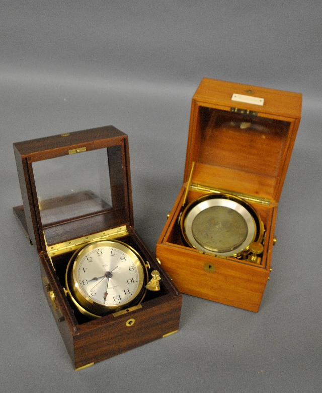 Appraisal: - Mahogany cased chronometer th c and a contemporary chronometer