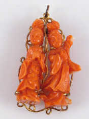 Appraisal: A Chinese coral brooch with yellow metal tests carat gold