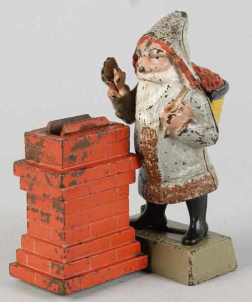 Appraisal: Cast Iron Santa at Chimney Mechanical Bank Description Manufactured by