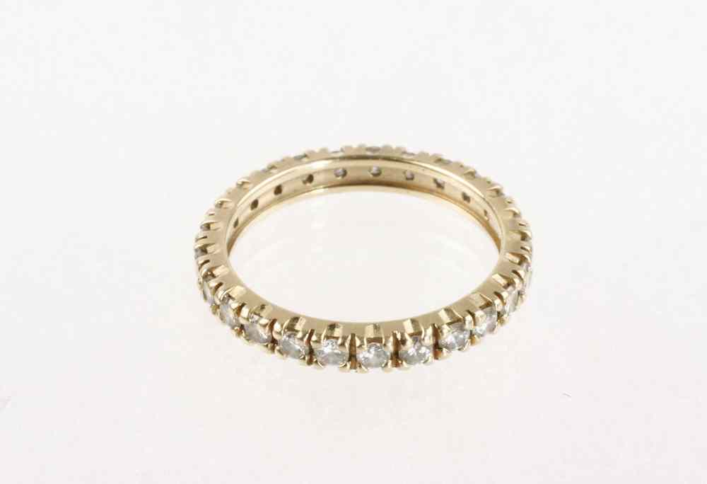 Appraisal: LADY'S RING - One custom made K yellow gold and