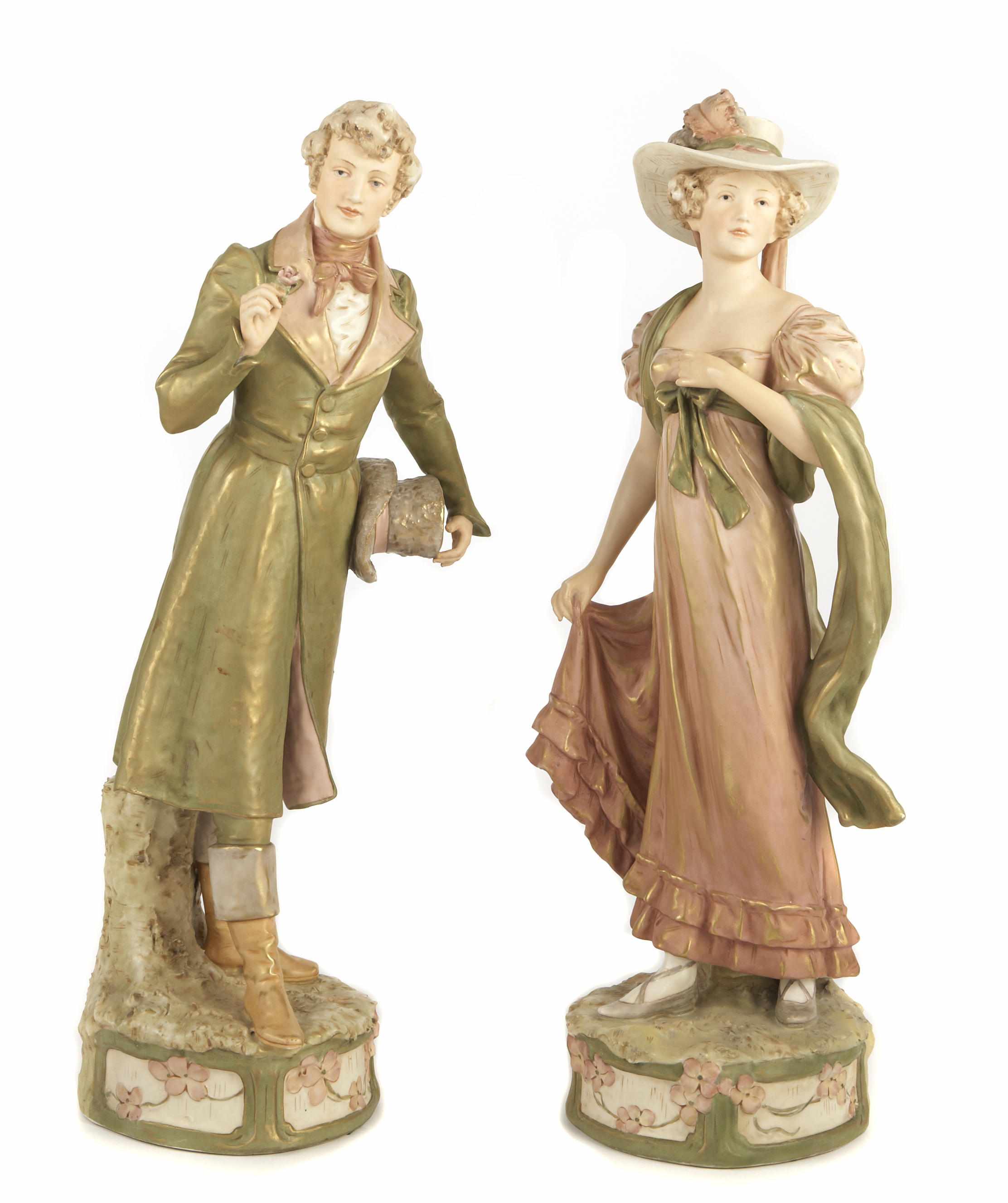 Appraisal: A pair of Royal Dux porcelain figures of a gentleman