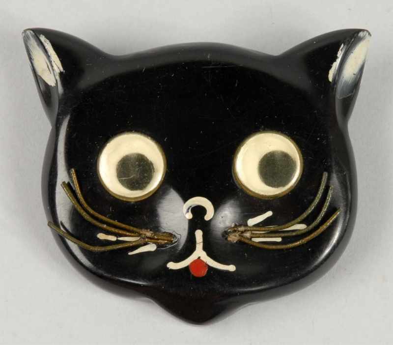 Appraisal: Bakelite Black Cat with Movable Eyes Pin Description Whiskers are