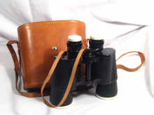 Appraisal: A cased pair of Eikow achromatic lens airport binoculars