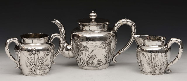 Appraisal: A CHINESE SILVER THREE PIECE TEA SET of baluster form