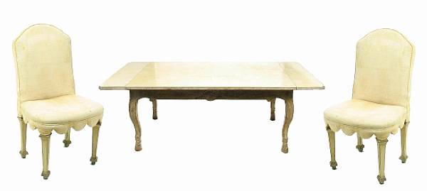 Appraisal: An Italian Rococo style paint decorated extension dining table and