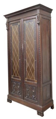 Appraisal: Italian Renaissance Revival walnut bookcase early th c accented by