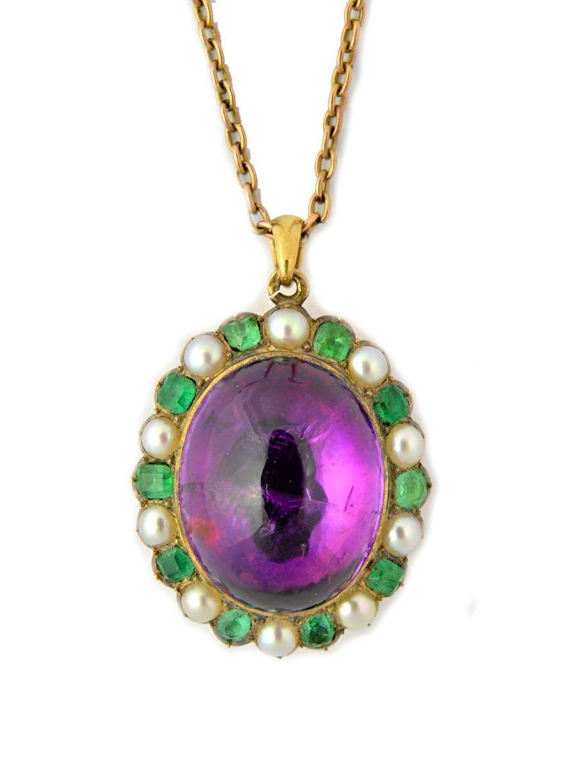 Appraisal: A gold cabochon amethyst emerald and cultured pearl pendant locket