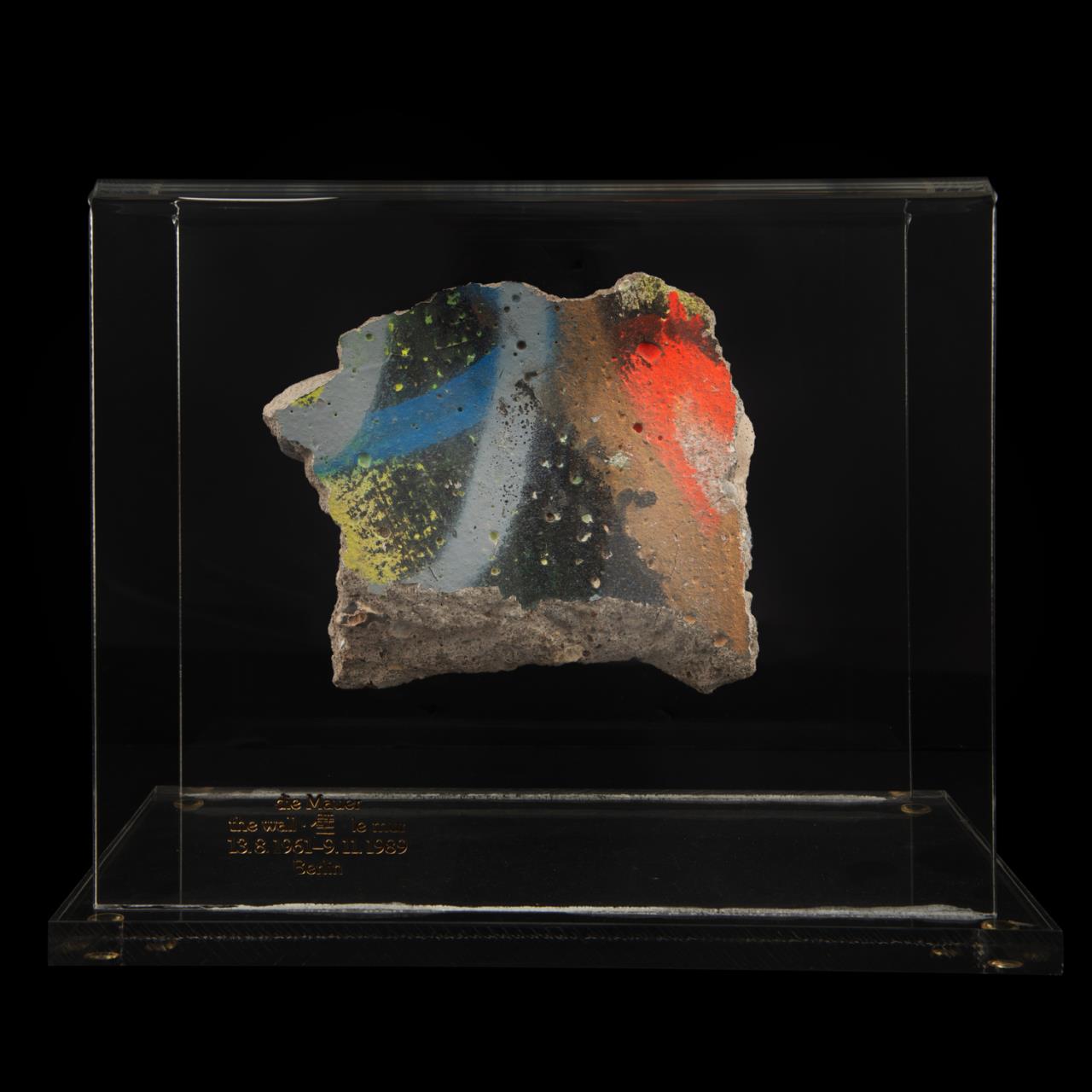 Appraisal: BERLIN WALL FRAGMENT IN ACRYLIC CASE Piece of the historic