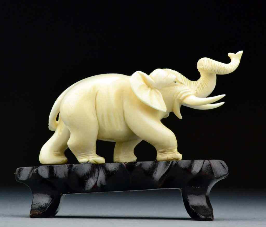 Appraisal: Chinese Carved Ivory Elephant On StandFinely carved with great detail