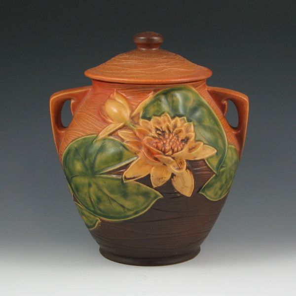 Appraisal: Roseville Water Lily lidded cookie jar in brown Marked Roseville