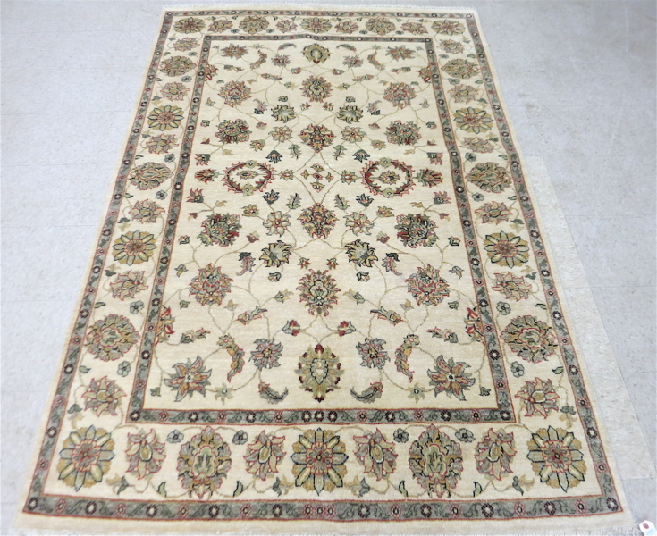 Appraisal: HAND KNOTTED ORIENTAL CARPET Indo-Persian overall Isfahan floral design on