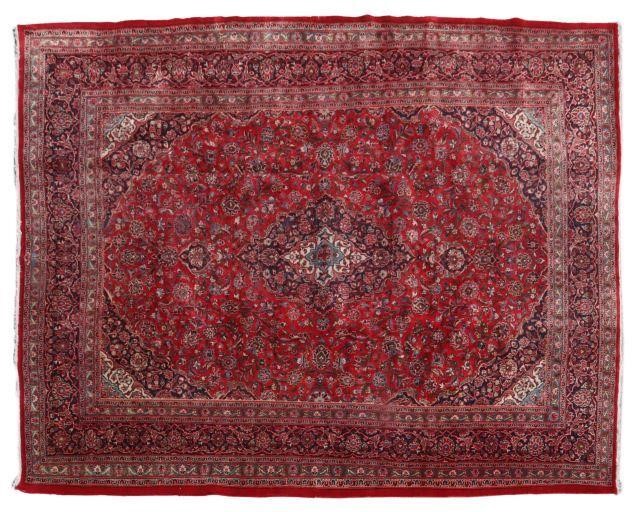 Appraisal: Hand-tied Persian Mashad rug approx ' l ' w