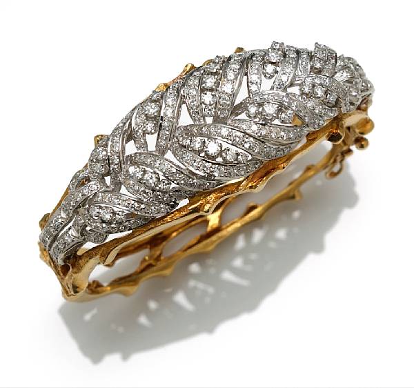 Appraisal: A diamond bangle bracelet estimated total diamond weight carats mounted