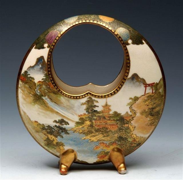 Appraisal: A SATSUMA EARTHENWARE FULL MOON VASE decorated a lake scene