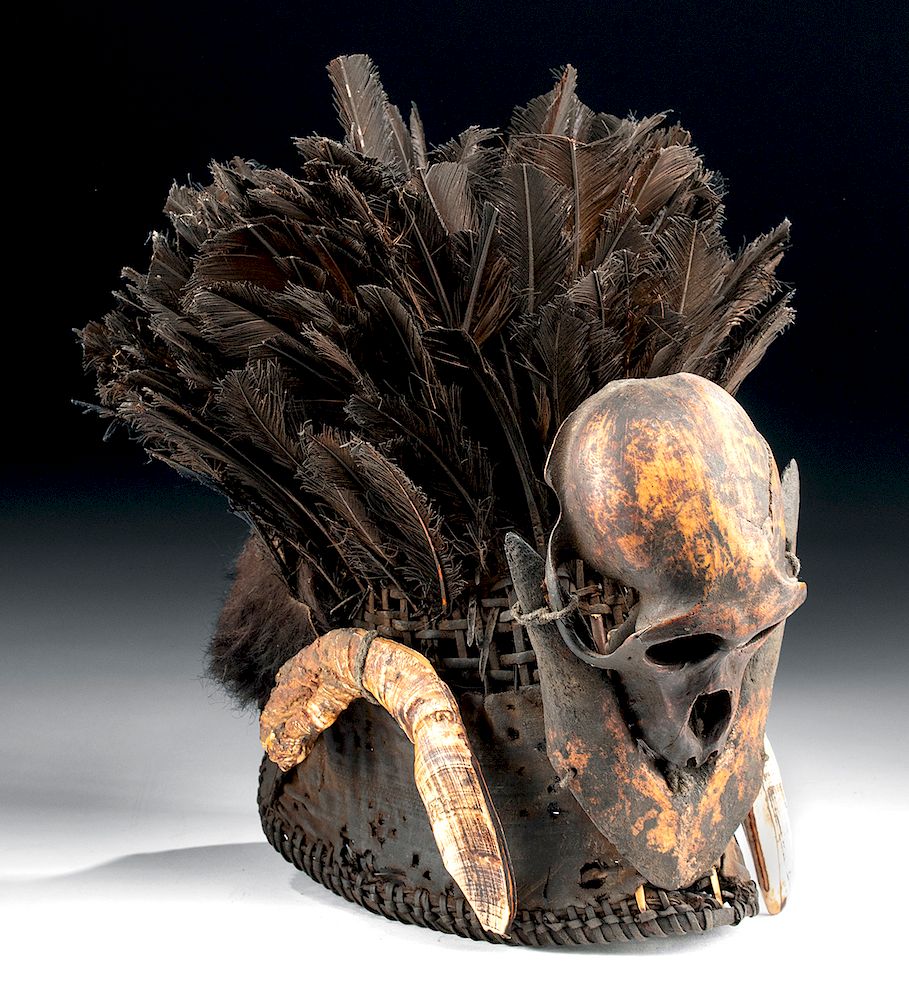 Appraisal: th C Indian Naga Hat w Monkey Skull Feathers Central