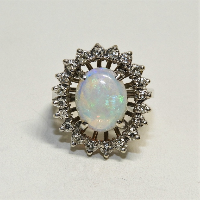 Appraisal: FINE OPAL DIAMOND LADY'S COCKTAIL RING th CenturyCenter prong mounted