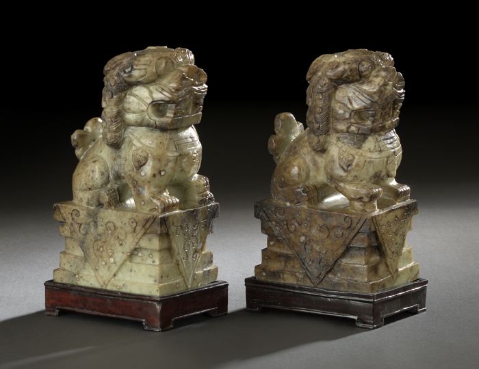 Appraisal: Pair of Chinese Carved Serpentine Figures of Foo Dogs each