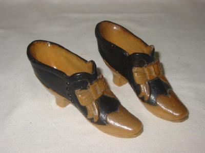 Appraisal: A PAIR OF SALT GLAZE SHOES modelled with small heel