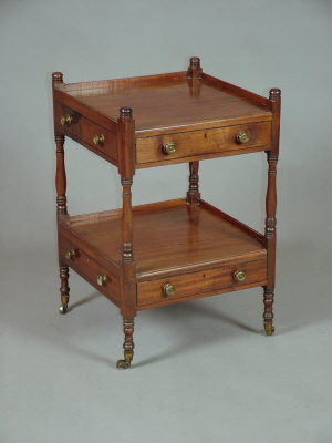 Appraisal: A Regency mahogany two tier whatnot the domed and ring