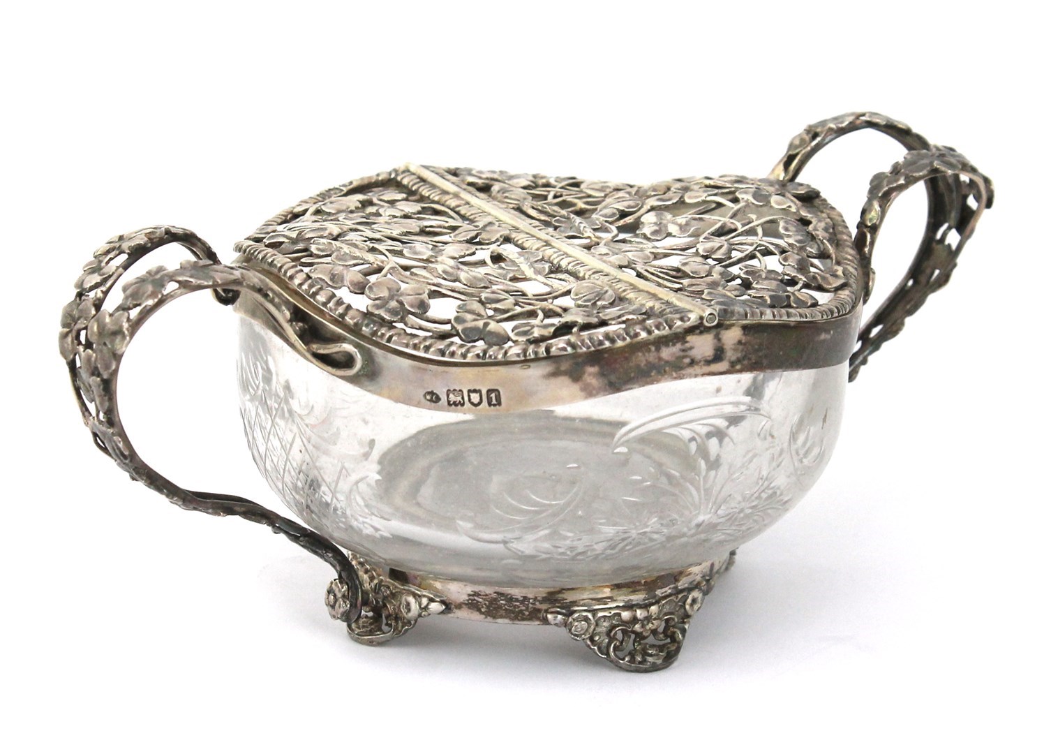 Appraisal: A silver mounted colourless glass twin handled potpourri bowl the