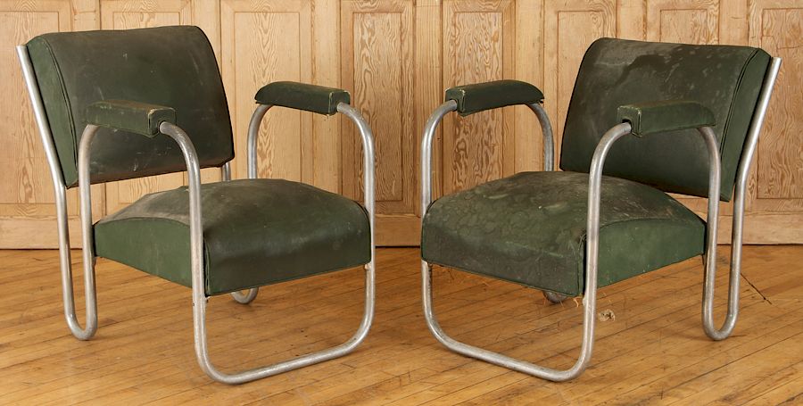 Appraisal: PAIR MID CENTURY MODERN INDUSTRIAL ARM CHAIRS A pair of