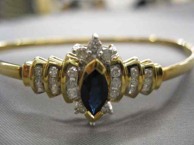 Appraisal: Sapphire Diamond Bracelet marquis shape deep blue gem and diamonds