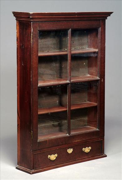 Appraisal: A George II mahogany hanging bookcase circa the moulded cornice