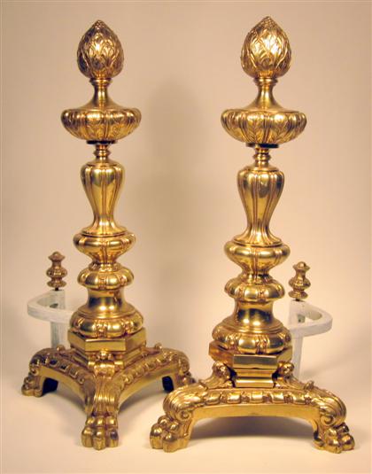 Appraisal: Pair of Louis XV style brass andironsAcorn finial over lobed