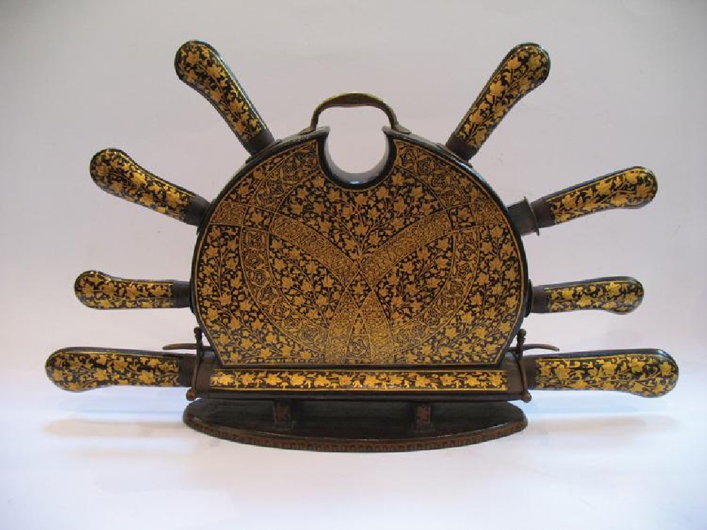 Appraisal: AN INDIAN LACQUER CUTLERY STAND with gilt decoration containing four