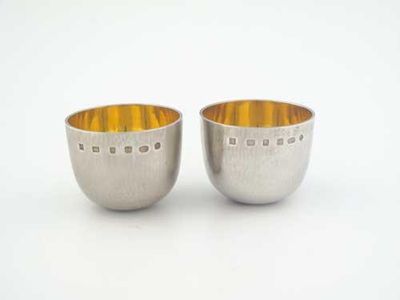 Appraisal: A pair of modern small tumbler cups with gilt interiors