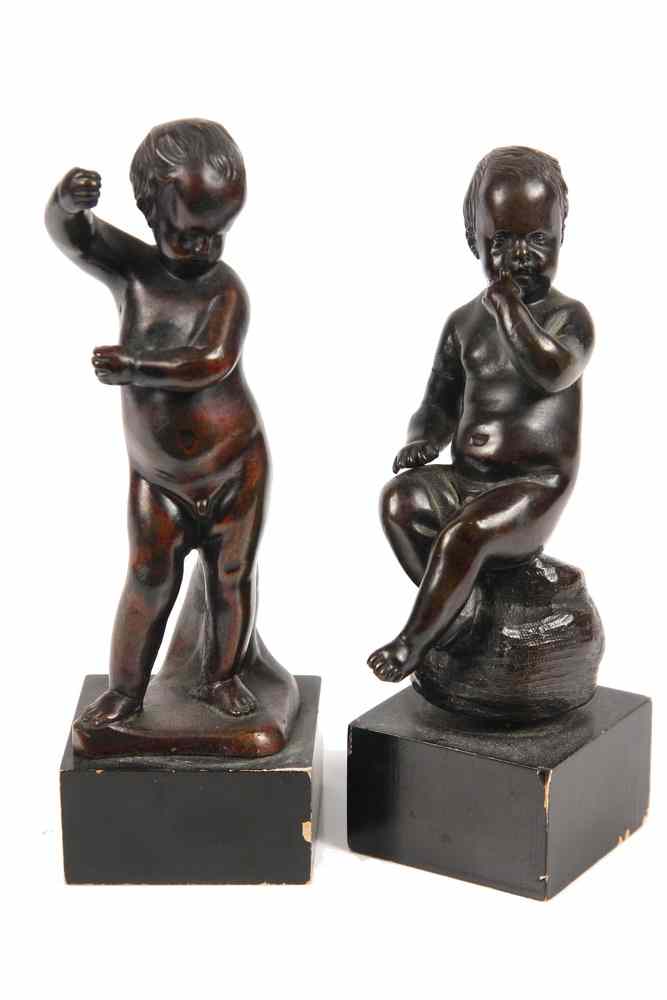 Appraisal: PAIR OF BRONZES- two putti one seated the other standing