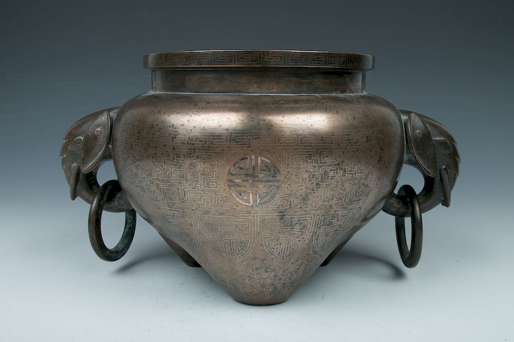 Appraisal: DOUBLE ELEPHANT EARS TRIPOD INCENSE BURNER SHISOU The cup modeled