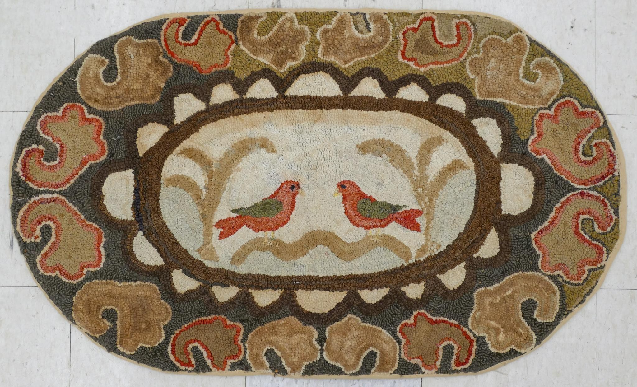 Appraisal: Antique Oval Hooked Bird Rug- ' ''x '