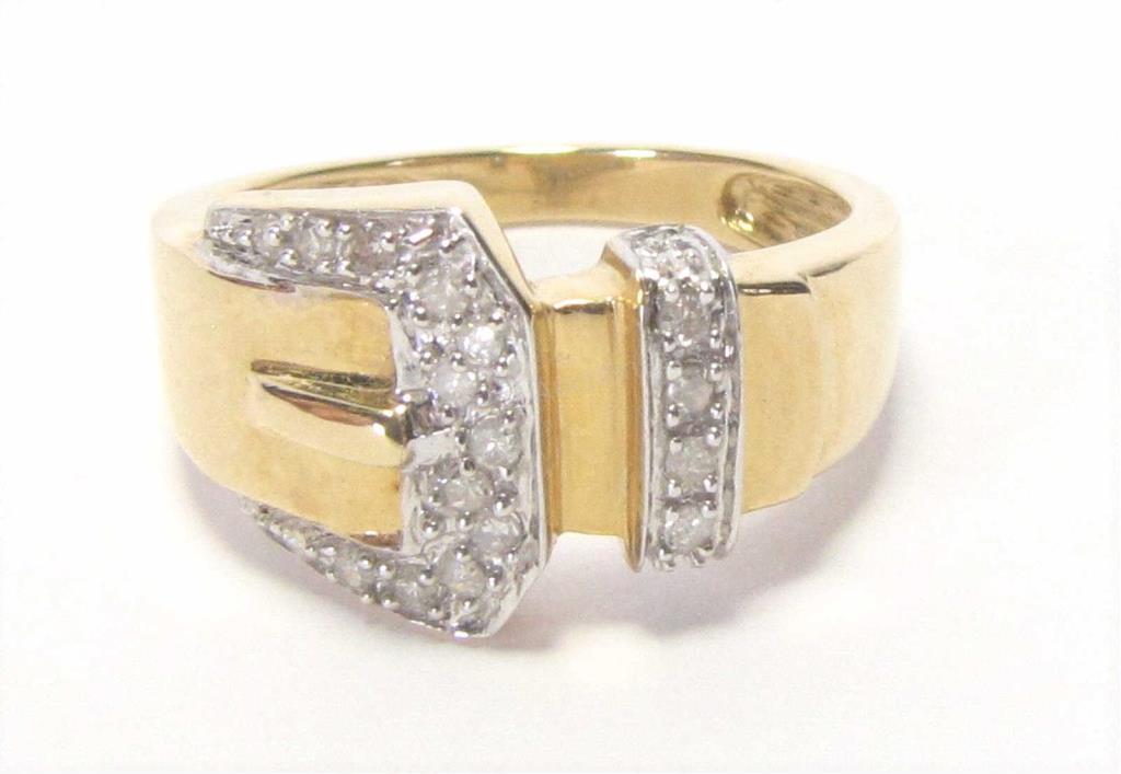 Appraisal: A K yellow gold buckle ring with seventeen round diamonds