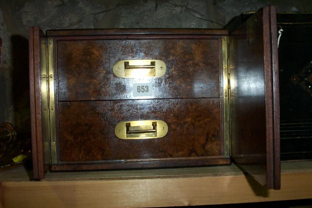 Appraisal: A Victorian walnut cabinet with a pair of doors enclosing