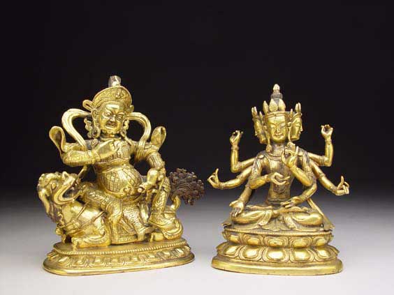 Appraisal: TWO GILT BRONZE DEITY FIGURES Two ornately cast Sino-Tibetan gilt