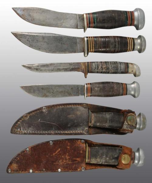 Appraisal: Lot of Hunting Knives with Leather Sheaths Description Includes one