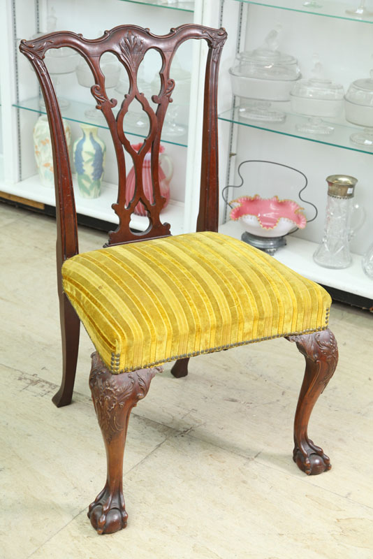 Appraisal: SIDE CHAIR Chippendale style with pierced splat and yellow upholstered