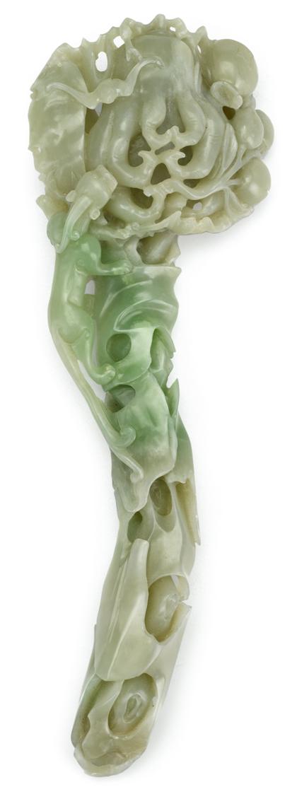 Appraisal: Chinese jade ruyi scepterCarved with a figure of a dragon