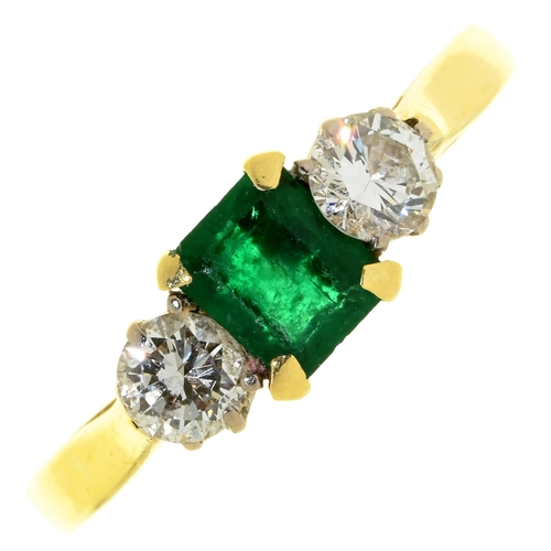 Appraisal: An emerald and diamond three stone ring the step cut