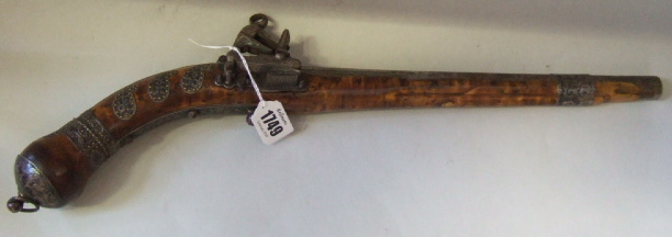 Appraisal: A Middle Eastern flintlock pistol th century cm barrel cm