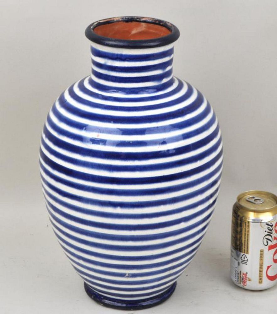 Appraisal: Moroccan Berber Glazed Earthenware Vase baluster form with blue concentric