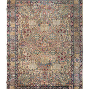 Appraisal: A Kirman Wool Rug First Half th Century feet inches