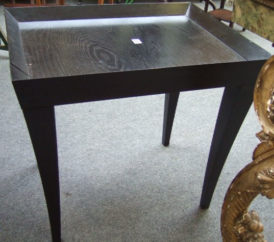 Appraisal: A pair of th century ebonised occasional tables each with