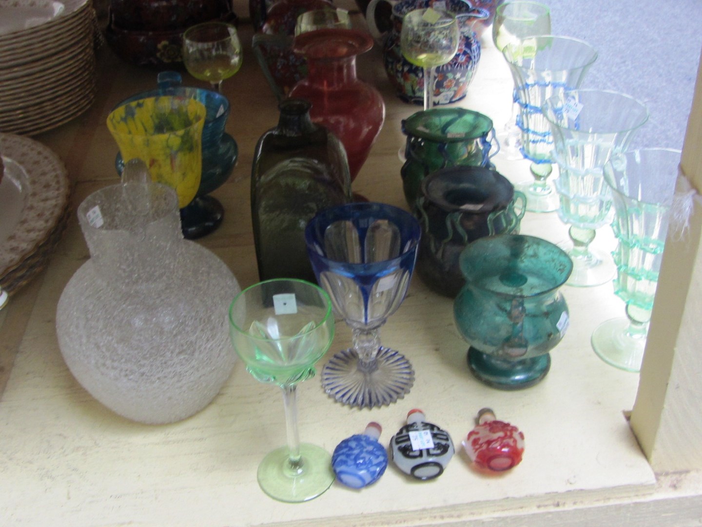 Appraisal: A quantity of coloured glass wares th century including a