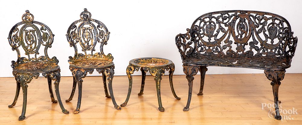 Appraisal: Four-piece Victorian cast iron garden suite Four-piece Victorian cast iron